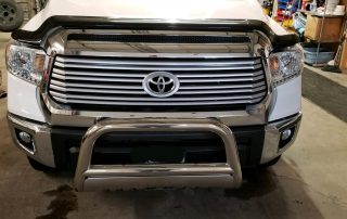 2017 Toyota Tundra with Stampede Hood Protector, Westin Bull Bars